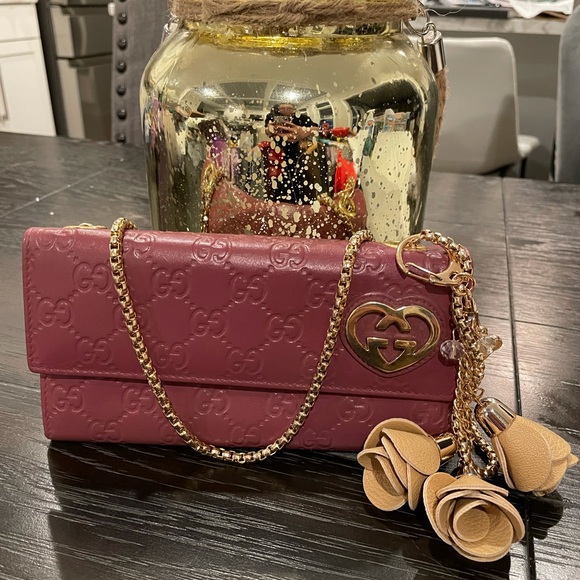 Gucci Handbags - Gucci GG Mauve Wallet with auth certificate